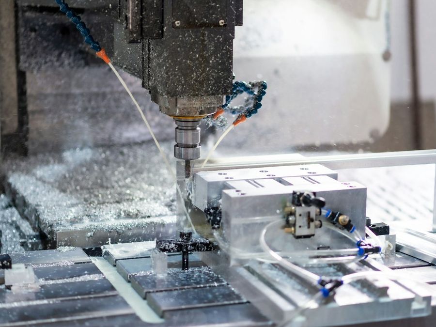 A CNC machine milling metal
